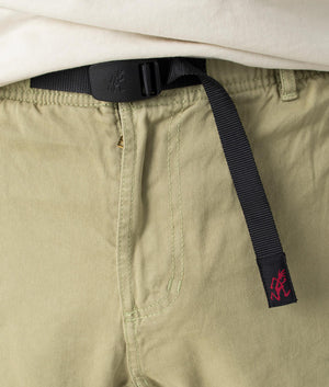 Gramicci Pants in Faded Olive. Front detail shot at EQVVS.
