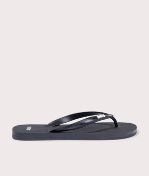 BOSS Tracy Flip Flops in Black. Side angle shot at EQVVS.