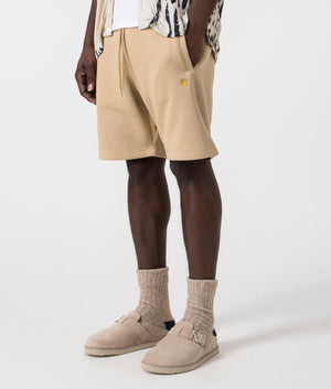 Carhartt WIP Chase Sweat short in 22IXX Sable/Gold  side front shot at EQVVS