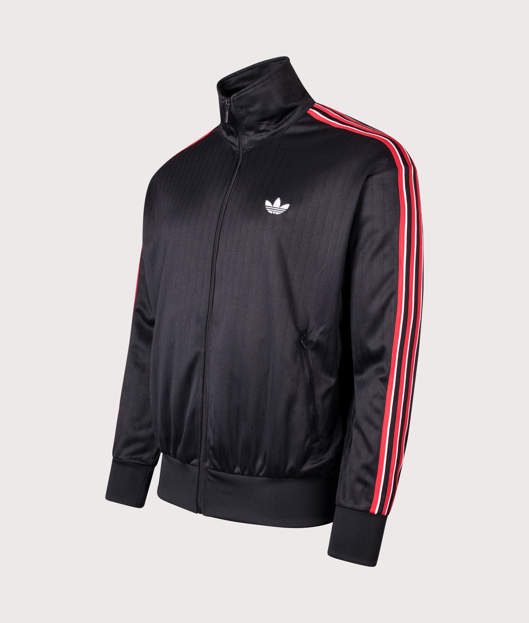 Firebird Pinstripe Track Top in Black | adidas Originals | EQVVS
