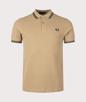 Twin Tipped Fred Perry Polo Shirt in Warm Stone. EQVVS Front Angle Shot.