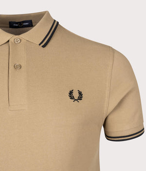 Twin Tipped Fred Perry Polo Shirt in Warm Stone. EQVVS Detail Shot.