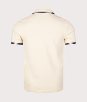 Twin Tipped Fred Perry Polo Shirt in Ice Cream and French Navy. EQVVS Back Angle Shot.