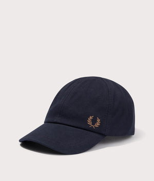 Pique Classic Cap in Navy by Fred Perry. EQVVS Side Angle Shot.
