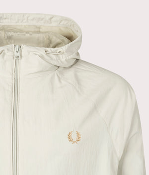 Hooded Shell Jacket in Light Oyster by Fred Perry. EQVVS Detail Shot.