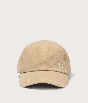 Pique Classic Cap in Warm Stone by Fred Perry. EQVVS Front Angle Shot.