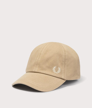 Pique Classic Cap in Warm Stone by Fred Perry. EQVVS Side Angle Shot.