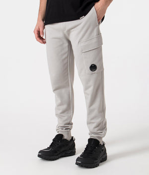 CP Company Diagonal Raised Fleece Cargo Joggers in Drizzle Grey Featuring the CP Goggle Angle Shot at EQVVS