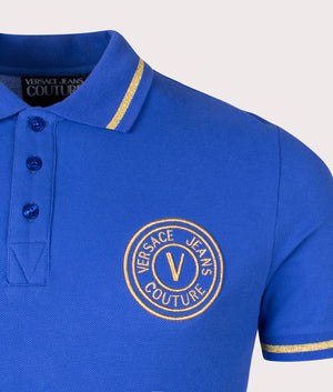 S V Emblem Gold Embroidered Polo Shirt in Space Gold by Versace Jeans Couture. EQVVS Detail Shot.