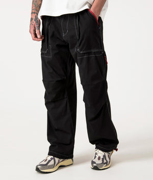 Public Utility Pants in Black by Pleasures. EQVVS Side Angle Shot.