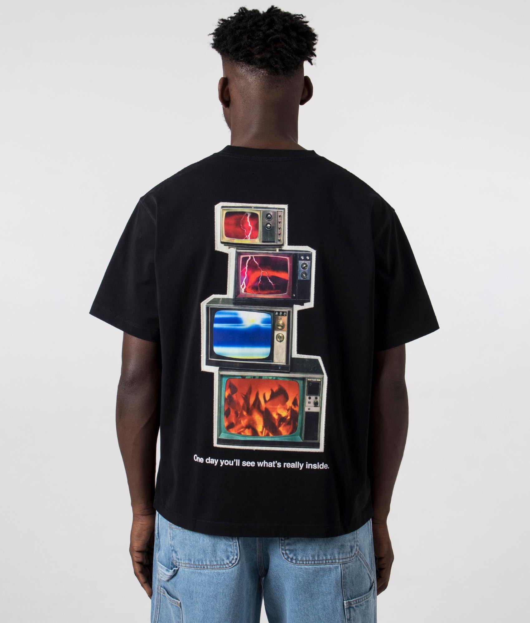 Appreciation Heavyweight T-Shirt in Black by Pleasures. EQVVS Back Angle Shot.