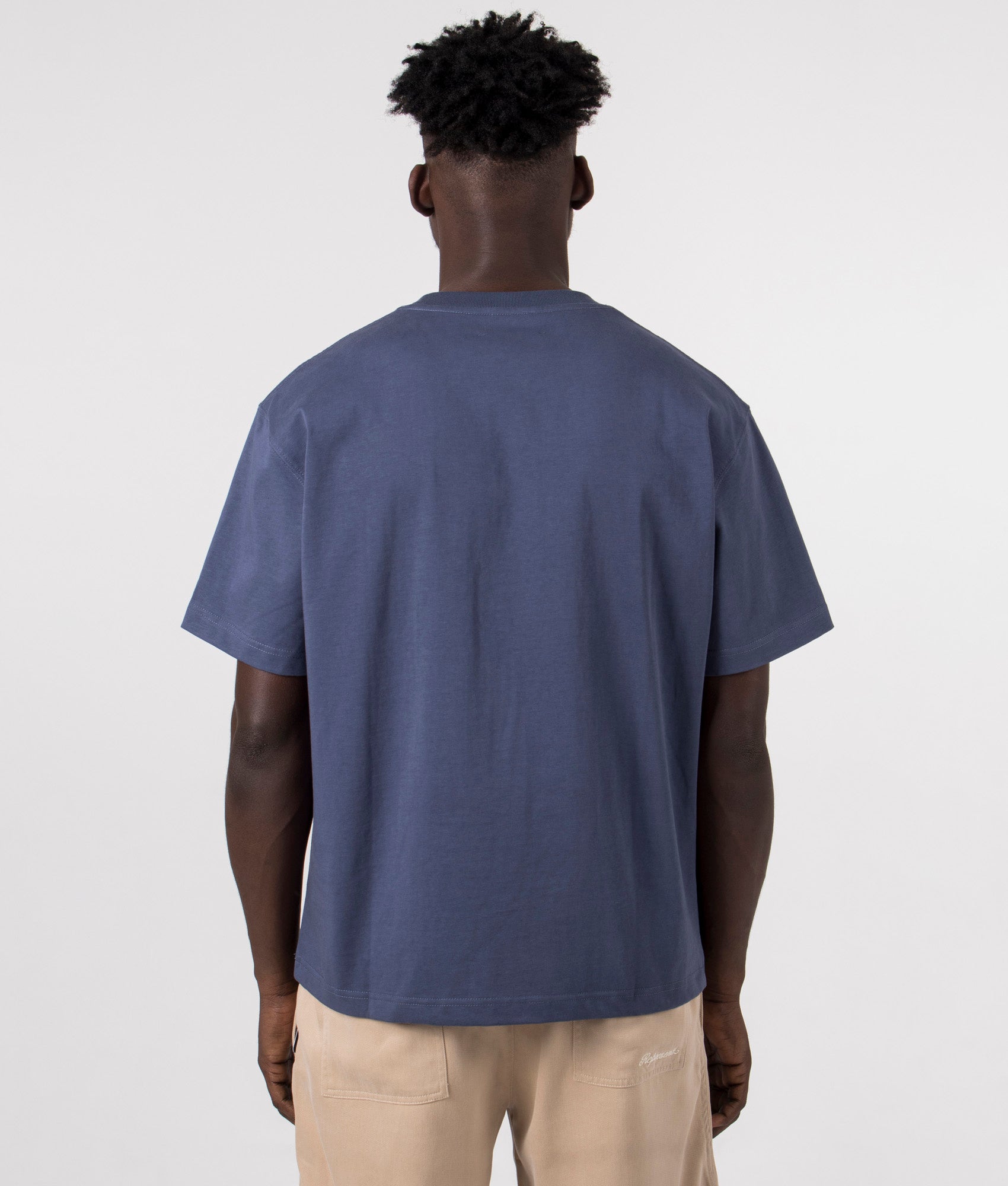 Stretch Heavyweight T-Shirt in Navy by Pleasures. EQVVS Model Shot.