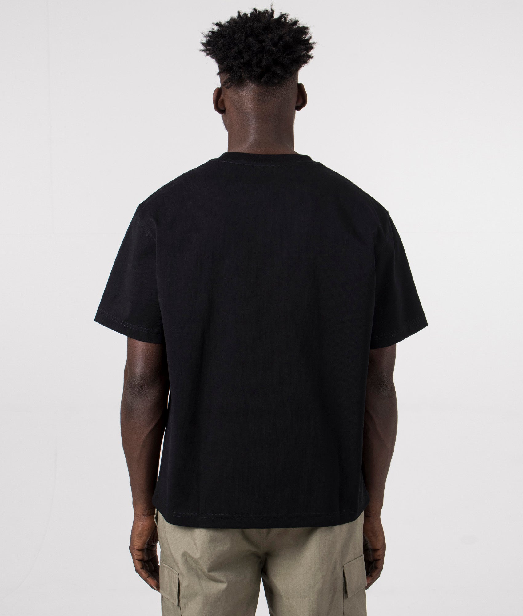Stretch Heavyweight T-Shirt in Black by Pleasures. EQVVS Model Shot.