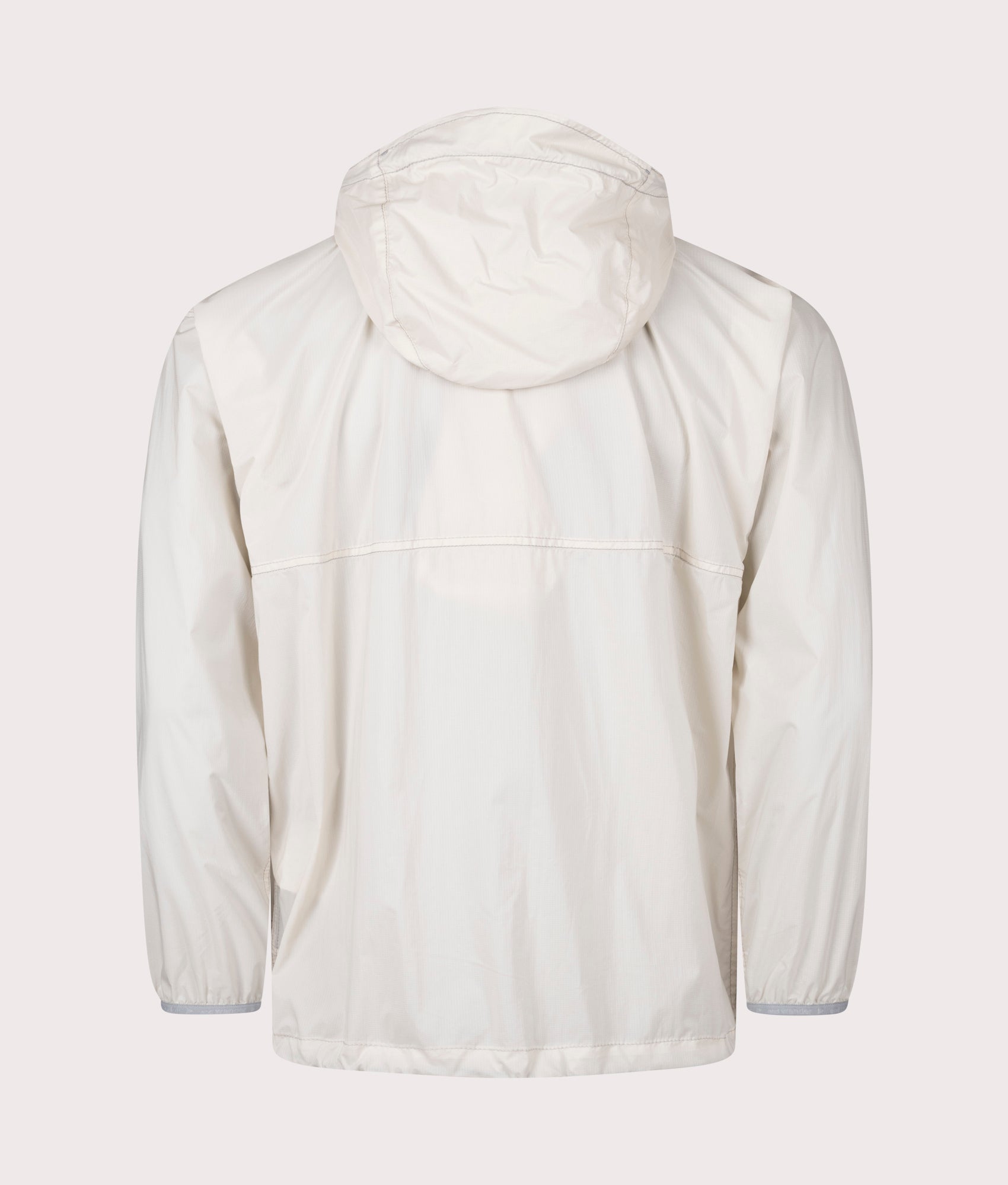 and wander Pertex Wind Jacket in Off White at EQVVS.  Back Shot.