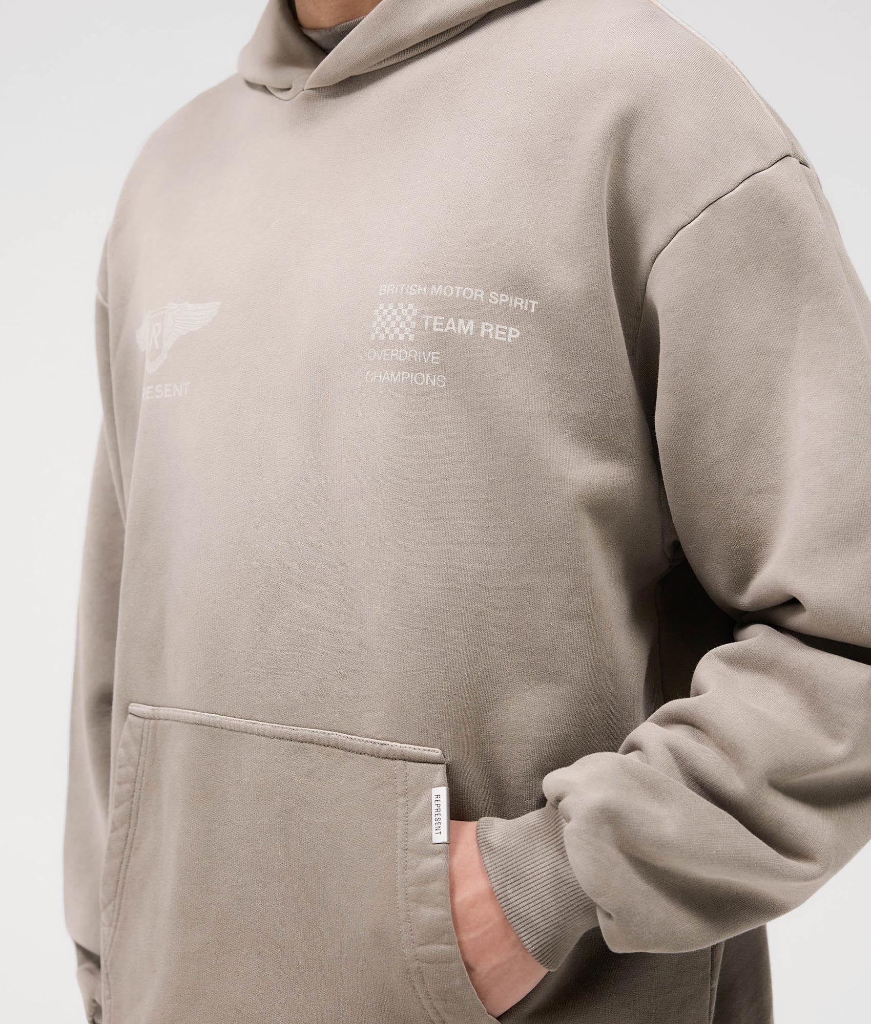 Represent Team Rep Hoodie in Dark Taupe at EQVVS. Detail Front Shot