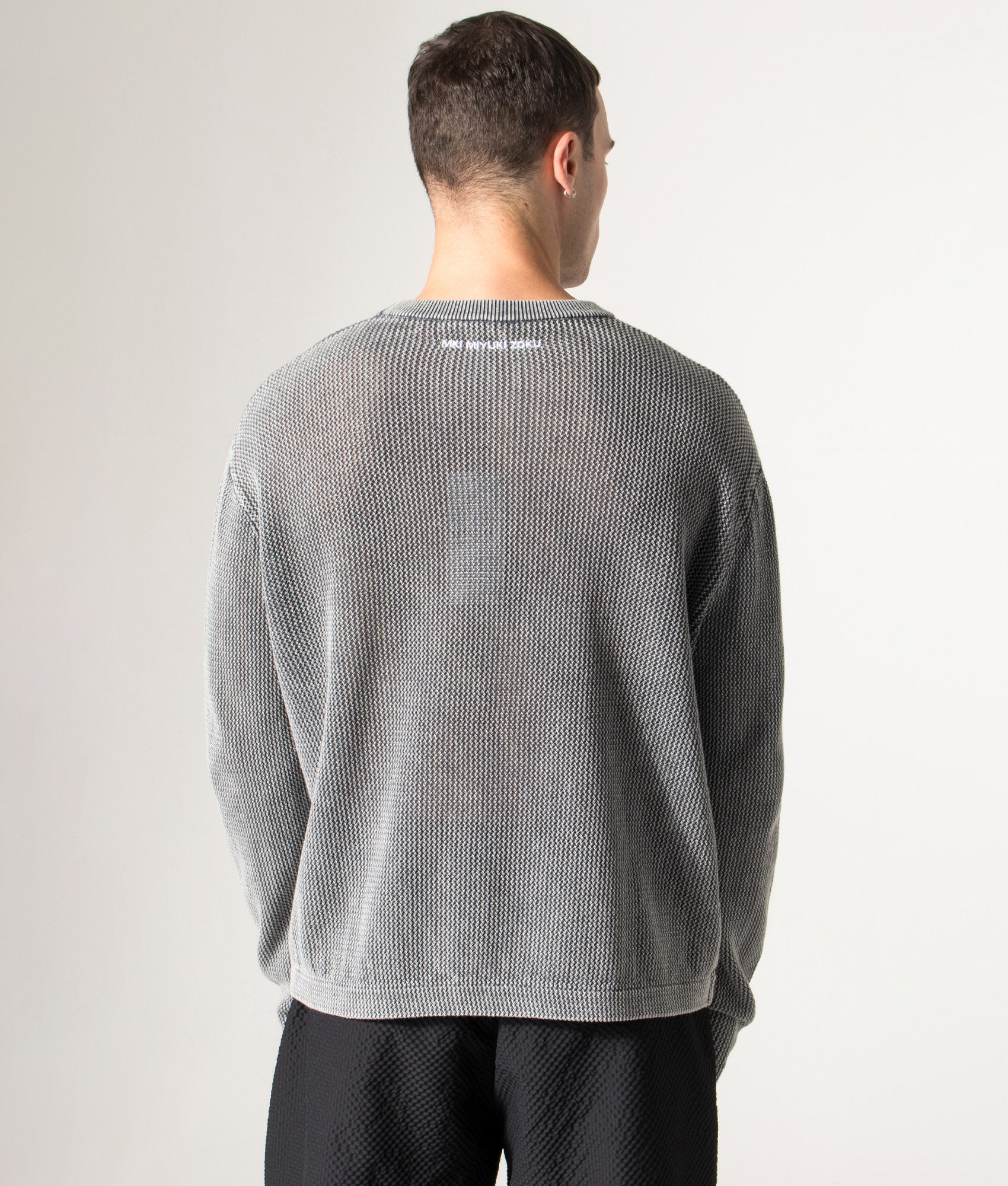 Pigment Dyed Loose Gauge Long Sleeve T-Shirt in Pigment Grey. | MKI MKI MIyuki Zoku | Model back shot