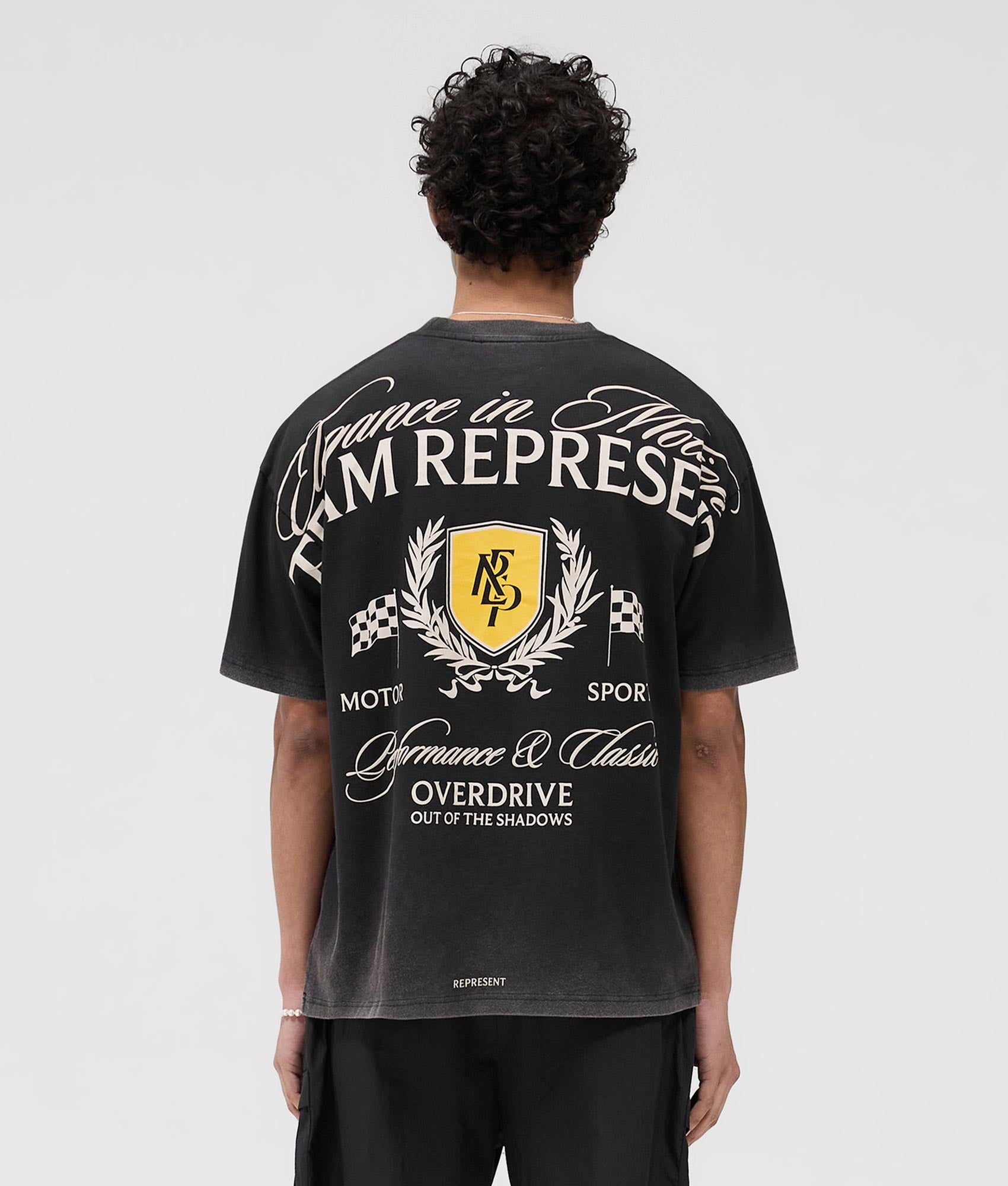 Represent Crest T-Shirt in Flat White at EQvVS. Back Model Shot