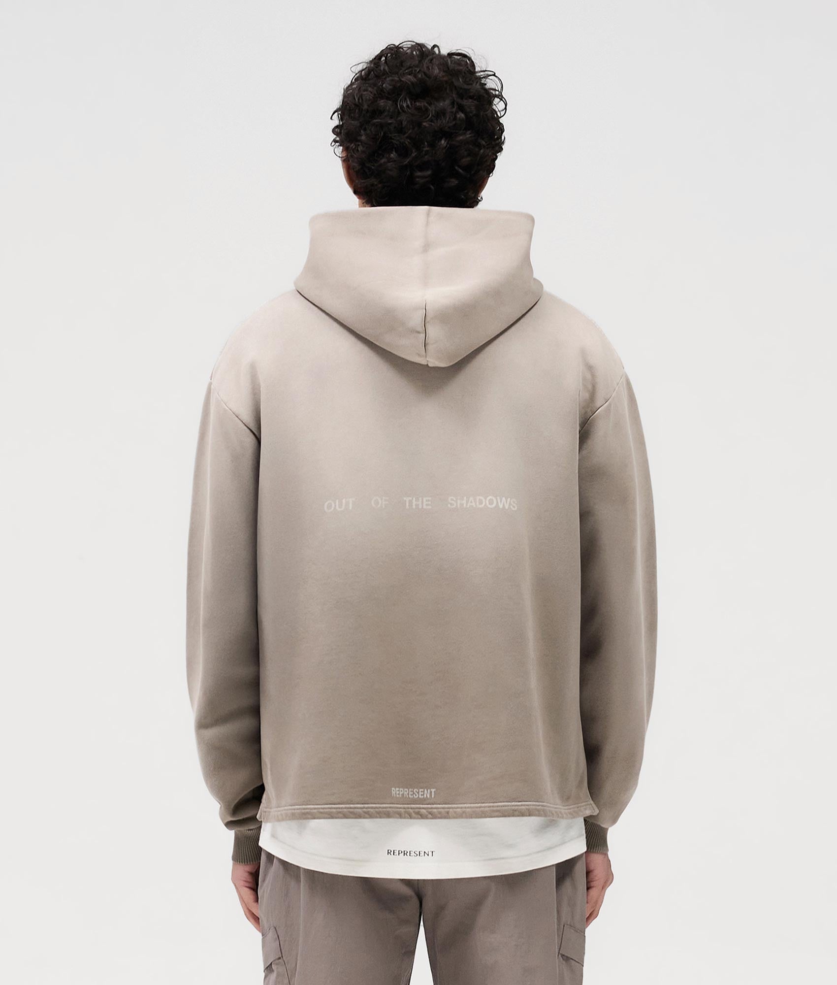 Represent Team Rep Hoodie in Dark Taupe at EQVVS. Model Back Shot