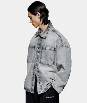 Denim Box Overshirt. hot by EQVVS. Model front angled shot.