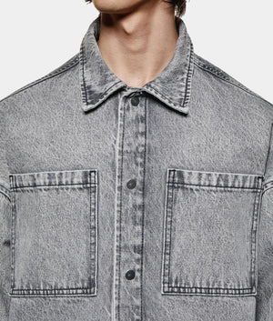 Denim Box Overshirt. hot by EQVVS. Model front detail shot.