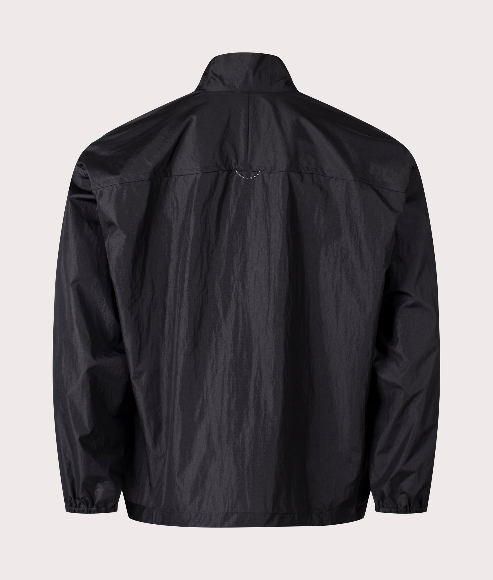 and Wander Oversized Rip Jacket in Black. Shot at EQVVS. Back shot 
