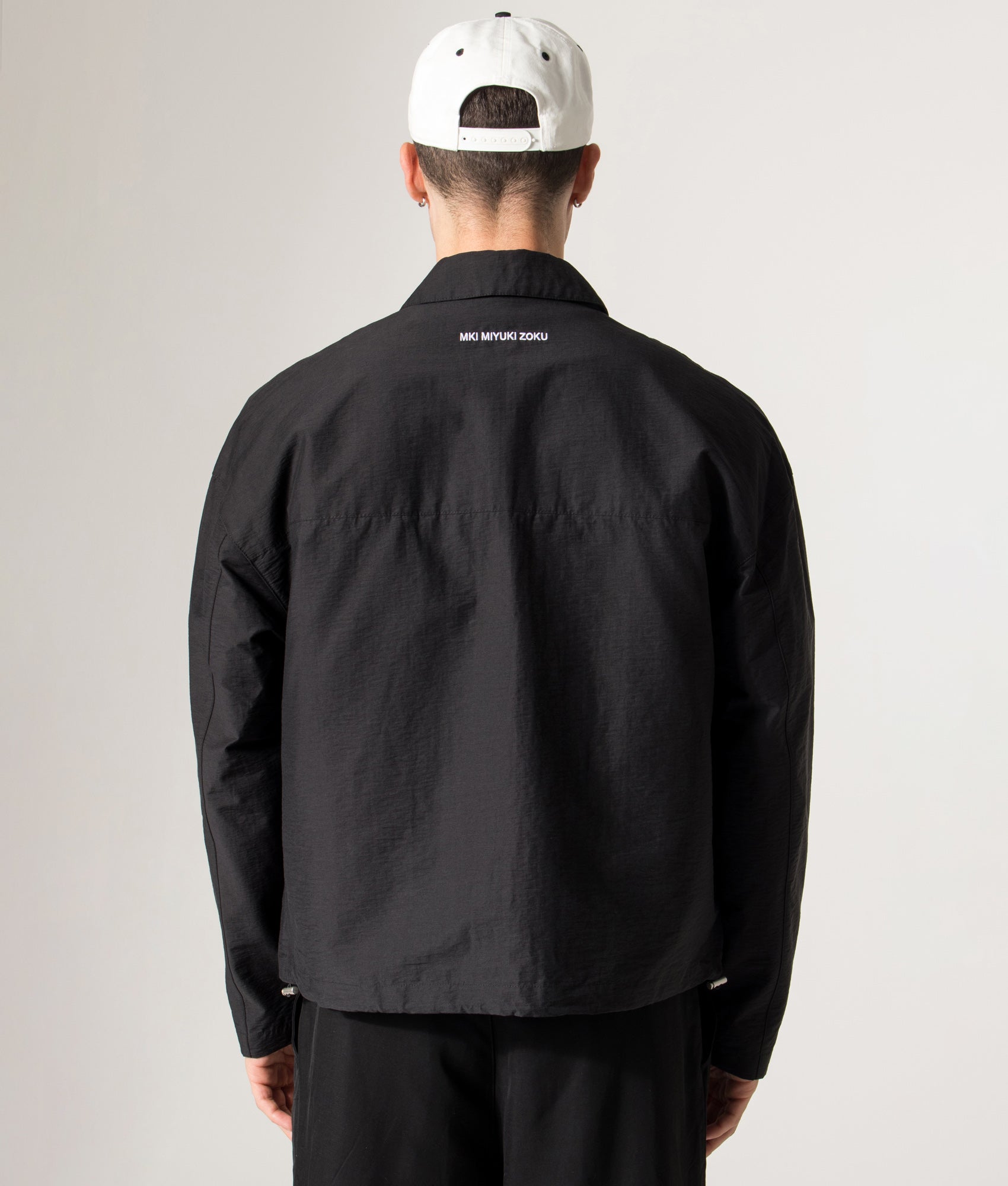 Box Overshirt in Black | MKI MIYUKI ZOKU | Shot at EQVVS | Back model shot 