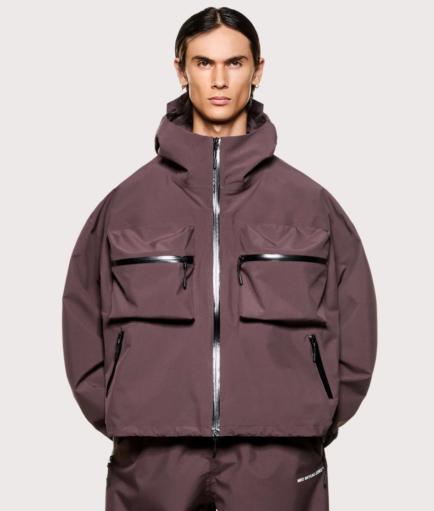 MKI MIYUKI ZOKU Shell Box Jacket in Raisin at EQVVS Menswear. Model front shot.