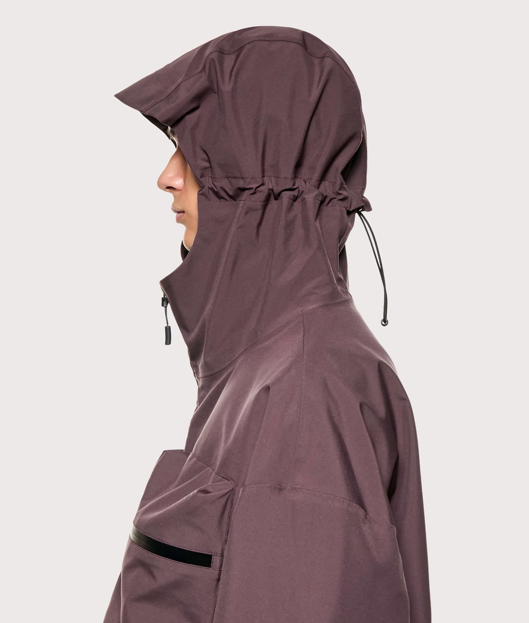 MKI MIYUKI ZOKU Shell Box Jacket in Raisin at EQVVS Menswear. Model hood detail shot.