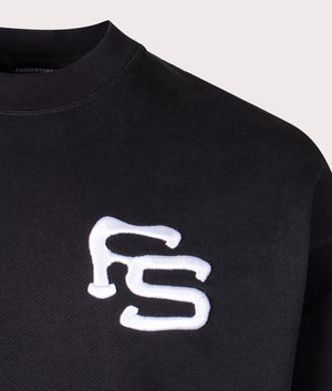 Embroidered Loopback Crew Sweatshirt in Black by Faded. EQVVS Detail Shot.