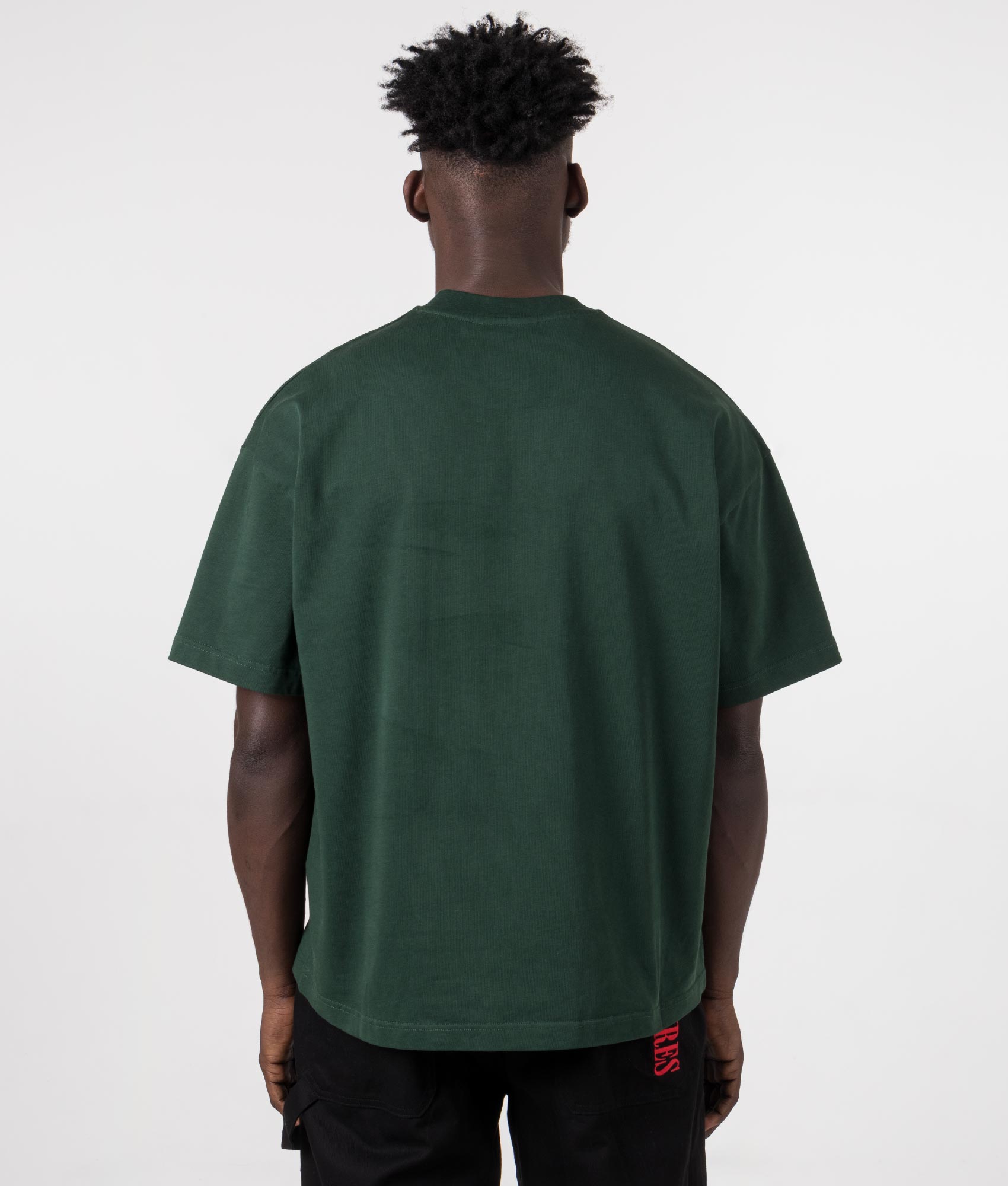 Oversized Uniform T-Shirt in Green from MKI MIYUKI ZOKU. Back Model Shot at EQVVS.