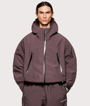 MKI MIYUKI ZOKU V3 Shell Hooded Jacket in Raisin at EQVVS Menswear. Model front shot. 