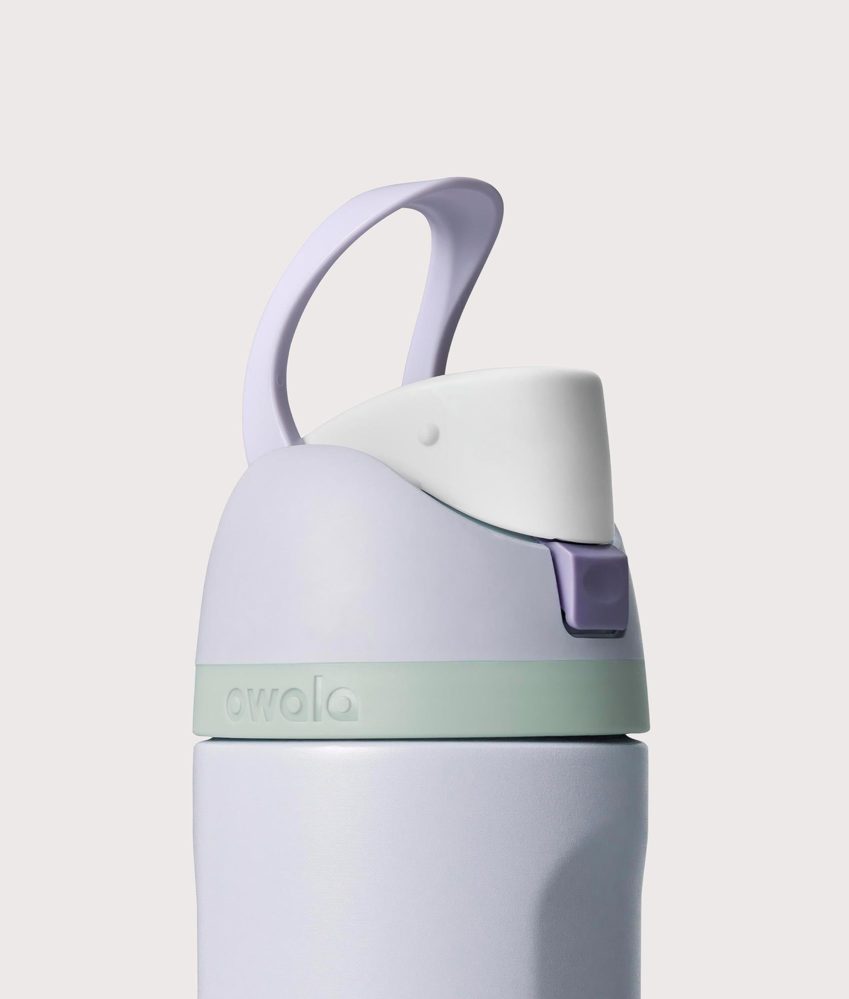 Owala FreeSip® 0.7L / 24-oz Water Bottle in Open Air at EQVVS Menswear. Carry loop shot.