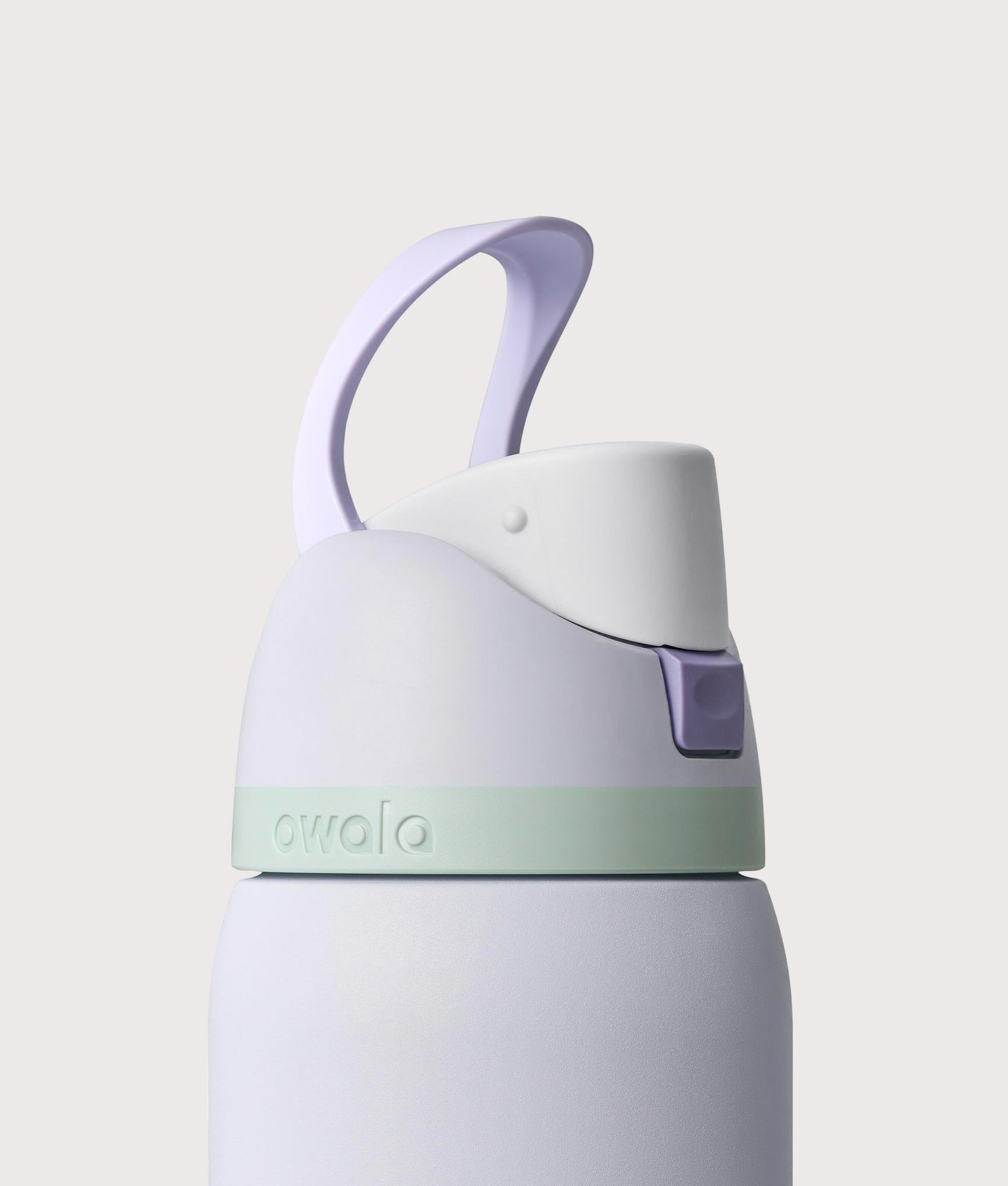 Owala FreeSip® 0.9L / 32-oz Water Bottle in Open Air at EQVVS Menswear. Carry loop shot.