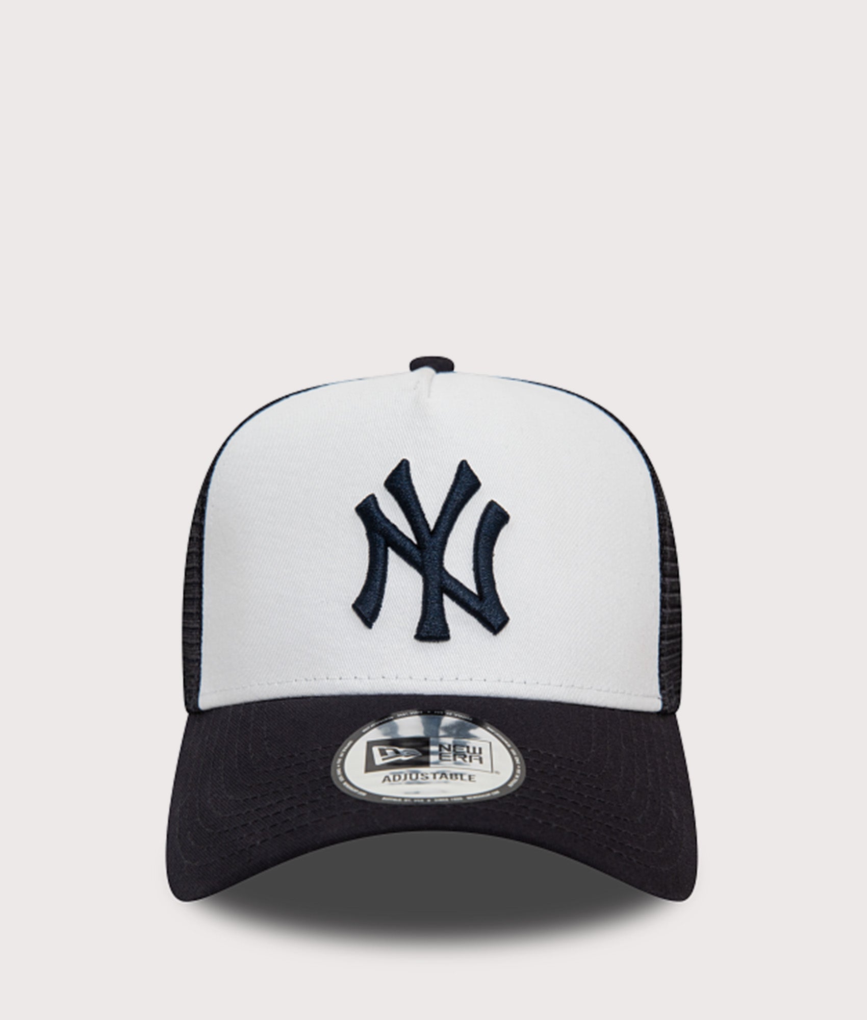 New Era New York Yankees Team Colour Block Trucker Cap in White at EQVVS Menswear. Front shot.