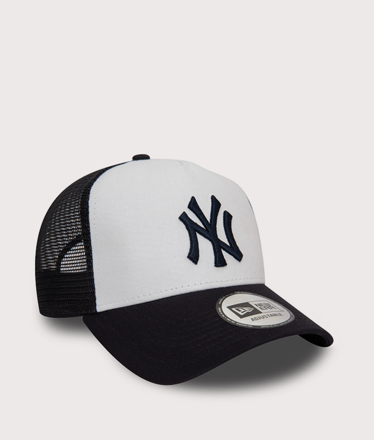 New Era New York Yankees Team Colour Block Trucker Cap in White at EQVVS Menswear. Angled front shot.