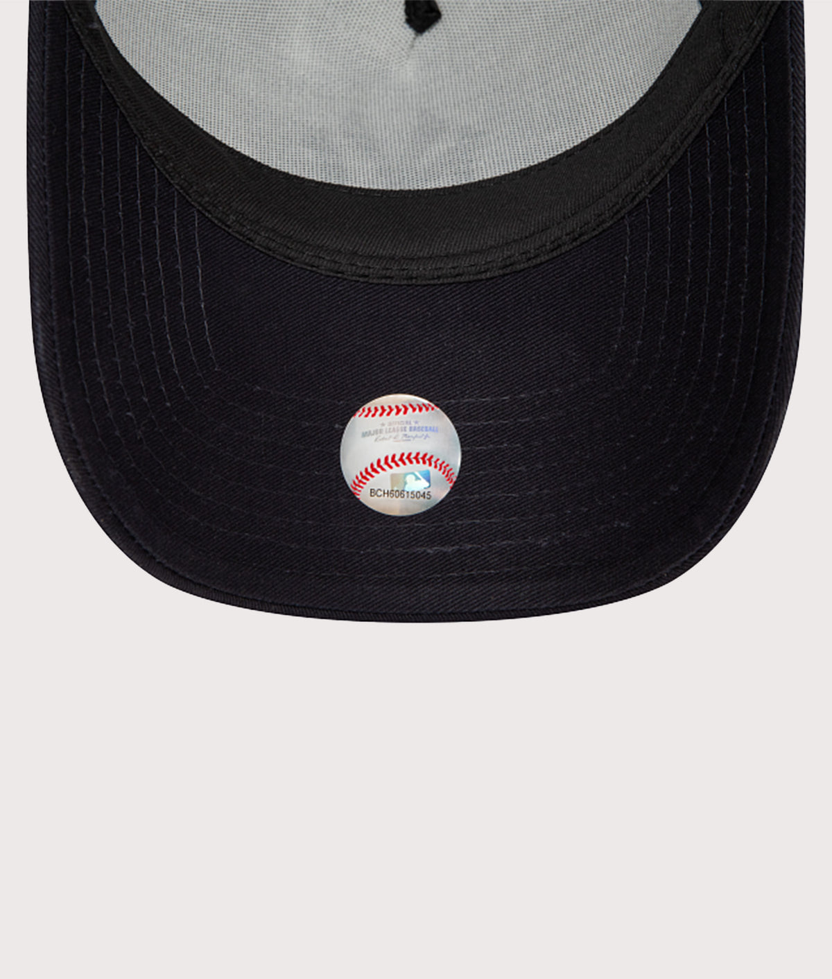 New Era New York Yankees Team Colour Block Trucker Cap in White at EQVVS Menswear. Peak shot.