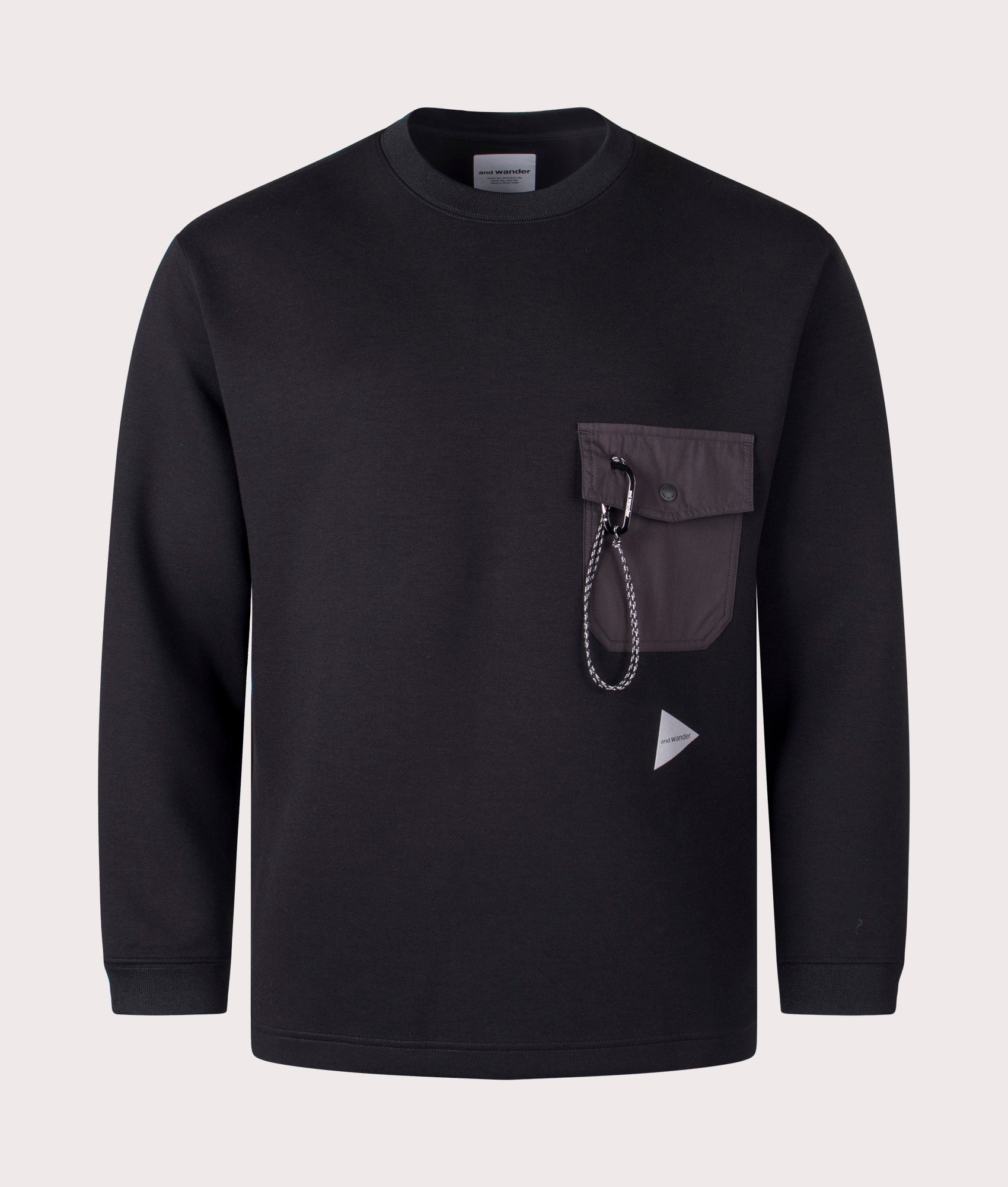 and wander Airly Warm Sweatshirt in black. Shot at EQVVS. Front mannequin shot. 