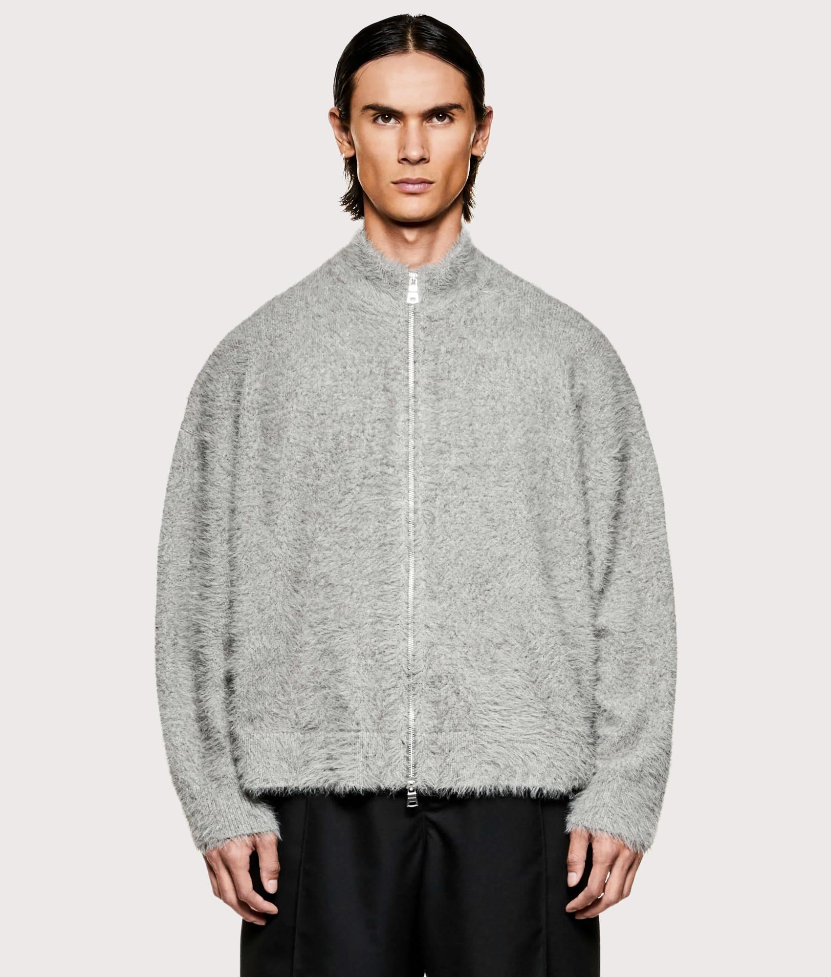 MKI MIYUKI ZOKU Faux Alpaca Knit Track Jacket in  Charcoal Melange at EQVVS Menswear. Model front shot.