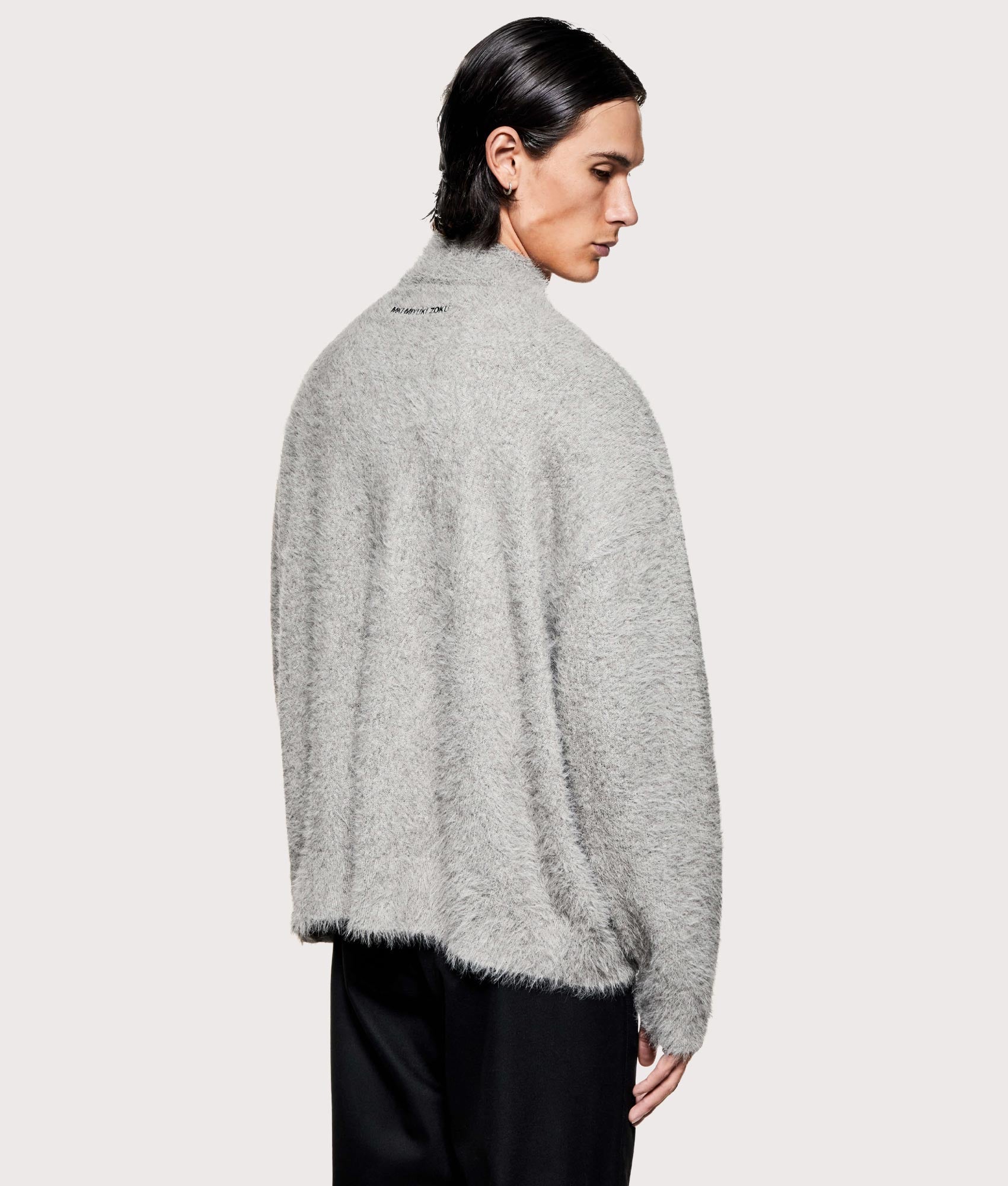 MKI MIYUKI ZOKU Faux Alpaca Knit Track Jacket in  Charcoal Melange at EQVVS Menswear. Angled back shot.