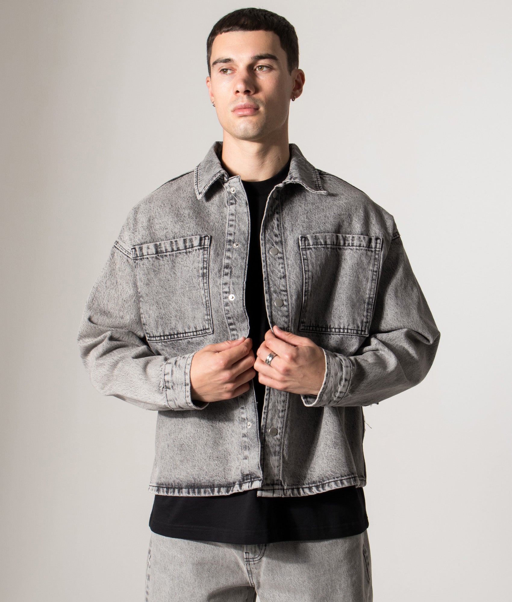 Denim Box Overshirt. Shot by EQVVS. Model front angled shot.