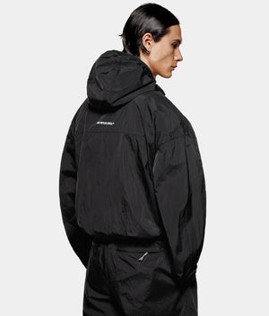 Active Nylon Hooded Jacket. Shot by EQVVs. Back model shot.