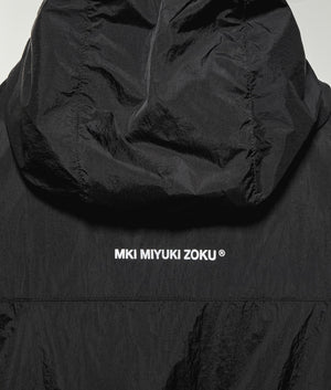 Active Nylon Hooded Jacket. Shot by EQVVs. Back model detail shot.