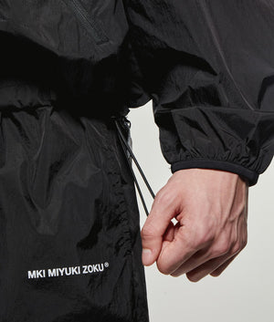Active Nylon Hooded Jacket. Shot by EQVVs. Front model detail shot.