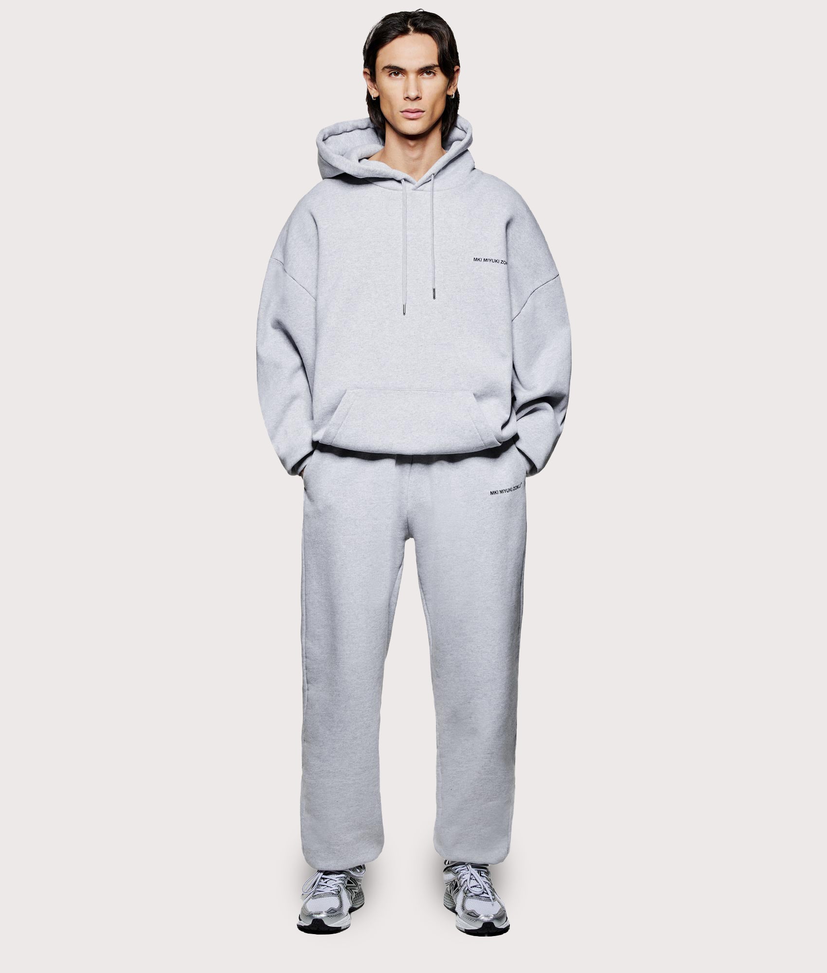 MKI MIYUKI ZOKU Oversized Uniform Hoodie at EQVVS Menswear. Model front shot.