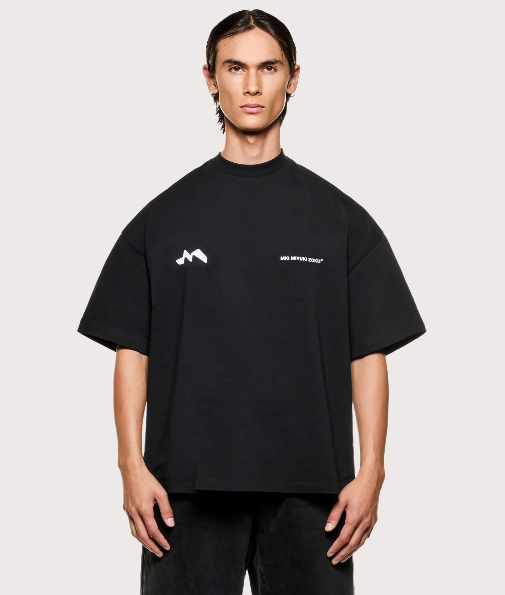 MKI MIYUKI ZOKU Silhouette T-Shirt in Black at EQVVS Menswear. Model front shot.