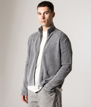 Pigment Dyed Loose Gauge Track Jacket. Shot by EQVVS. Model side angled shot.
