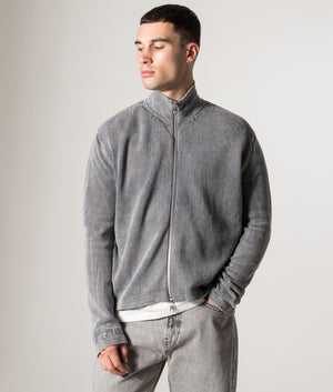Pigment Dyed Loose Gauge Track Jacket. Shot by EQVVS. Model front angled shot.