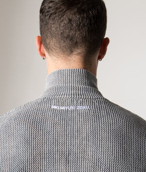 Pigment Dyed Loose Gauge Track Jacket. Shot by EQVVS. Model detailed angled shot.