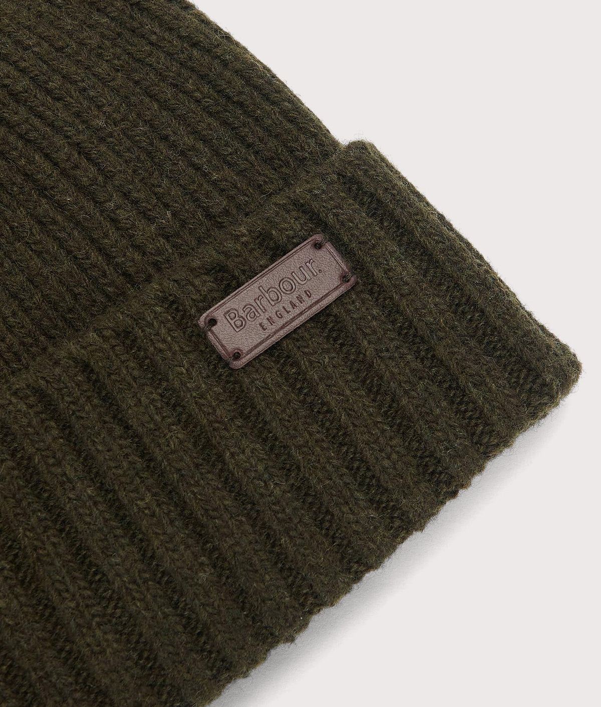 Barbour Lifestyle Carlton Beanie in Dark Green at EQVVS Menswear. Detail shot.
