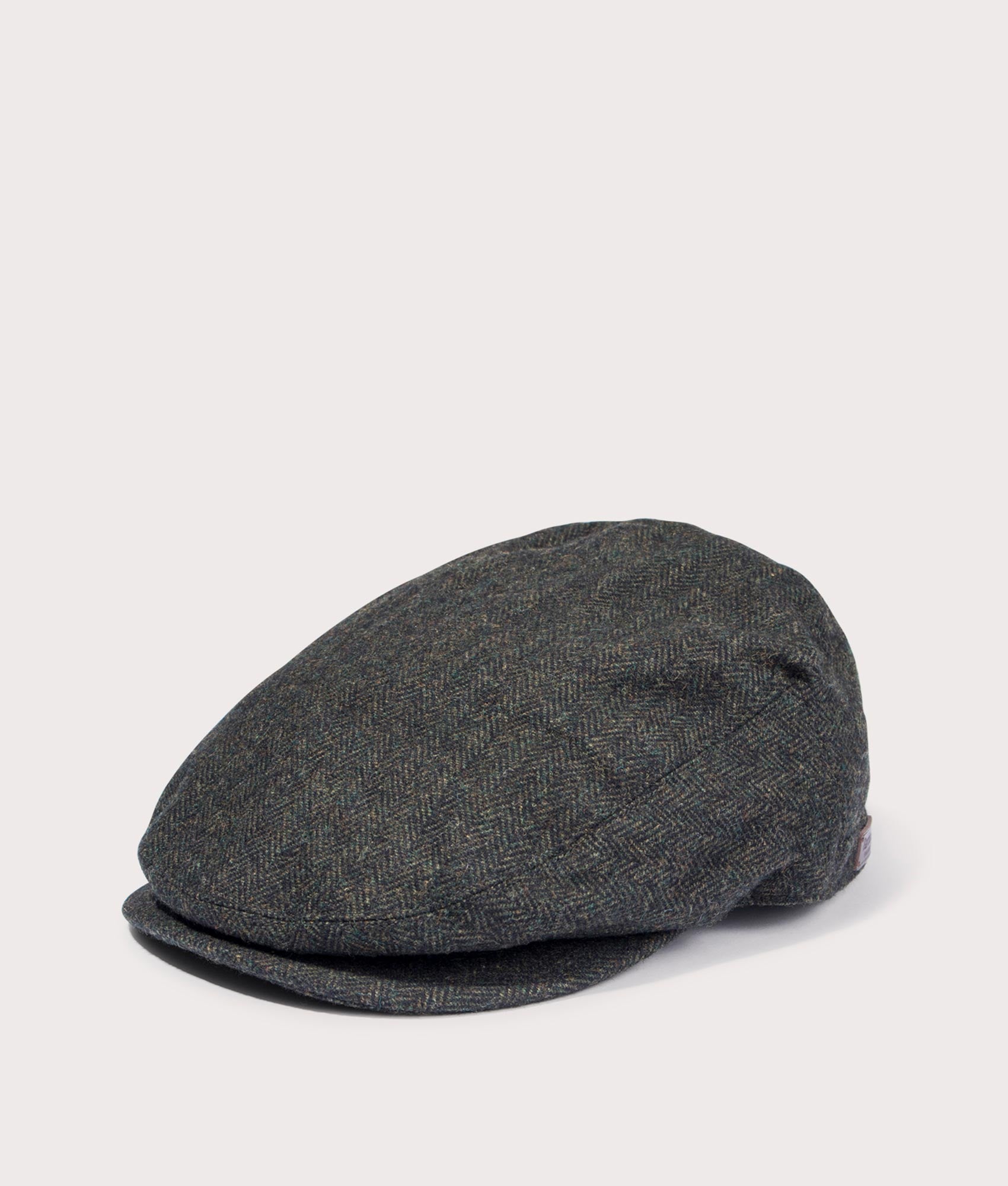 Barbour Lifestyle Barlow Flat Cap in Olive at EQVVS Menswear. Angled front shot.